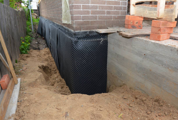 Happy homeowners after waterproofing job in Breckenridge